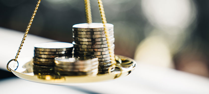 Geld auf der Waage